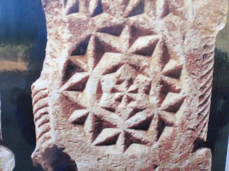Tombstone (Mezar Tasi, Grabstein) engraved with solar discs and geometrically derived crosses